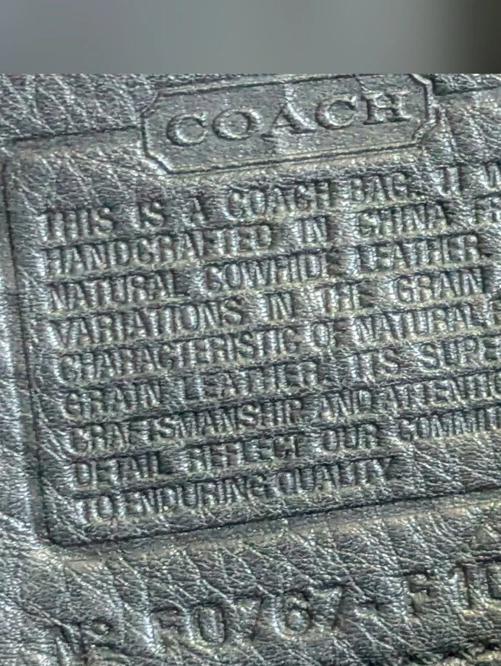 Coach structured leather